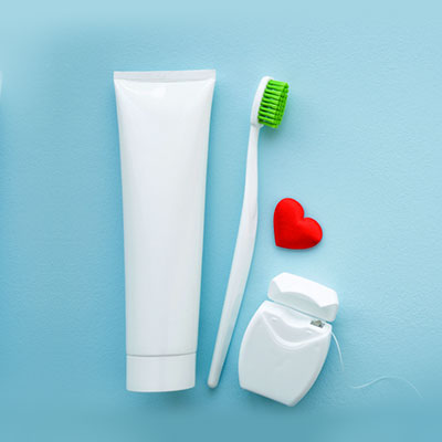 toothpaste and brush with heart
