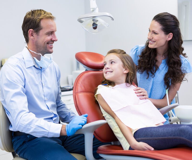 Child with parent at pediatric dental visit showing comfortable and friendly experience at Beach House Pediatric Dentistry